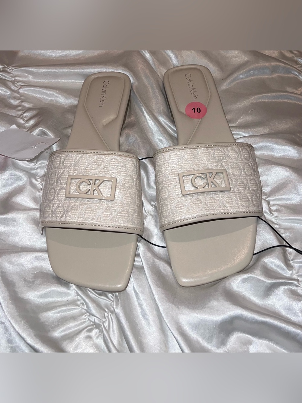 Calvin Klein cream monogram slide sandals
